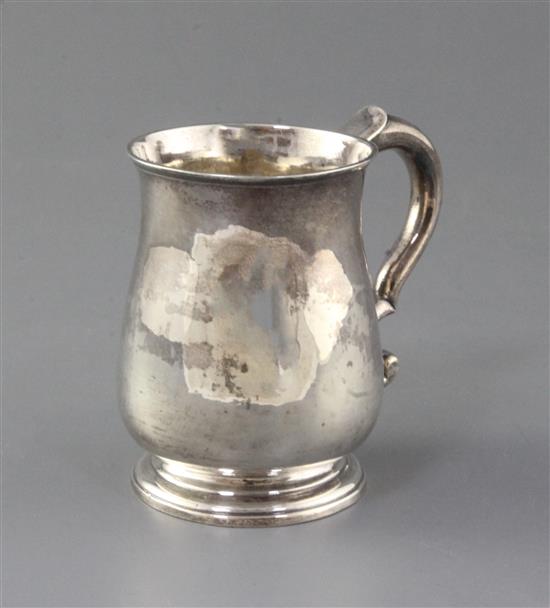 A George II provincial silver mug by John Elston Junior, 6 oz.